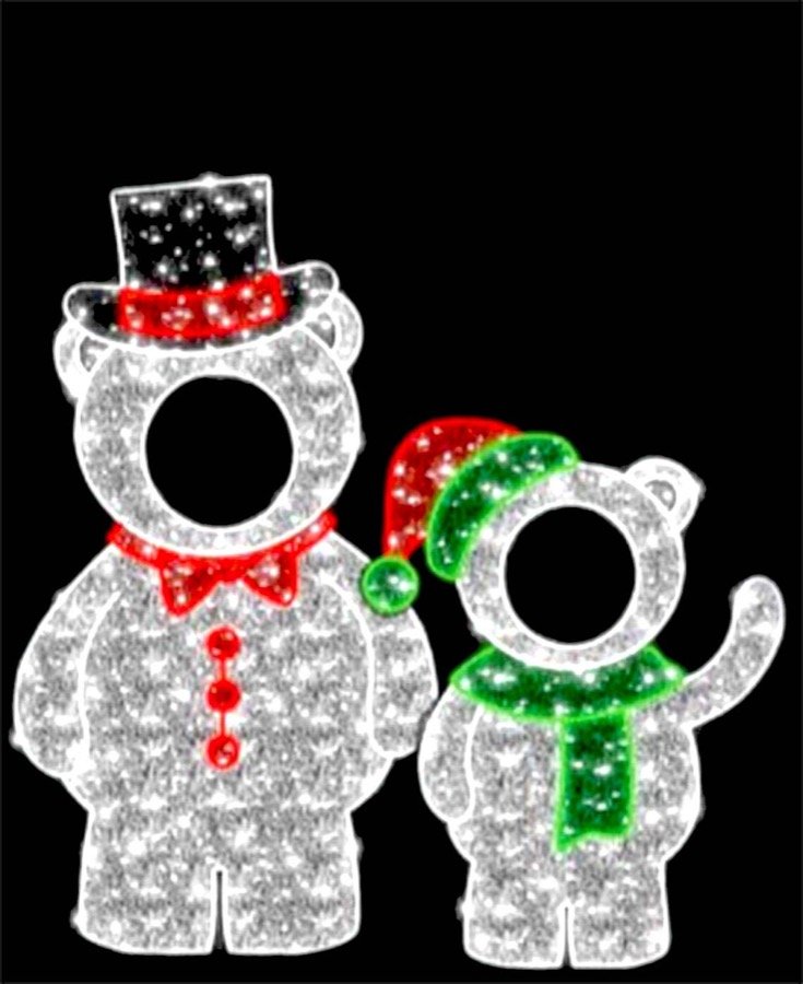 Illuminated bear figures with cut out faces for photographs.